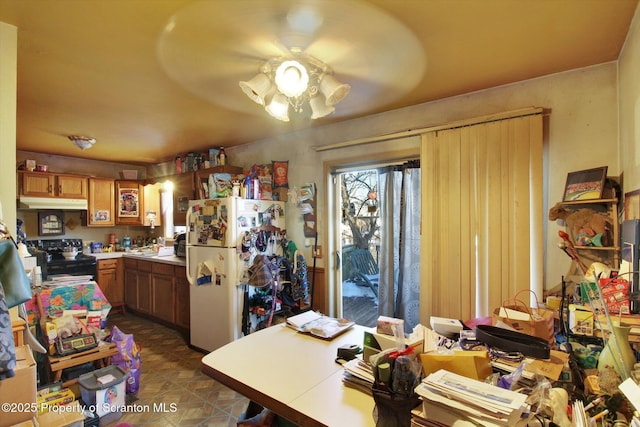 interior space featuring ceiling fan