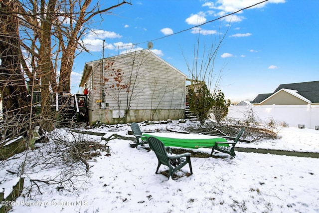 view of yard layered in snow