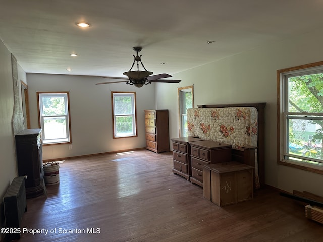 439 Old Union Rd, Equinunk, PA 18417 - unfurnished living room with wood finished floors, ceiling fan, recessed lighting, and radiator heating unit