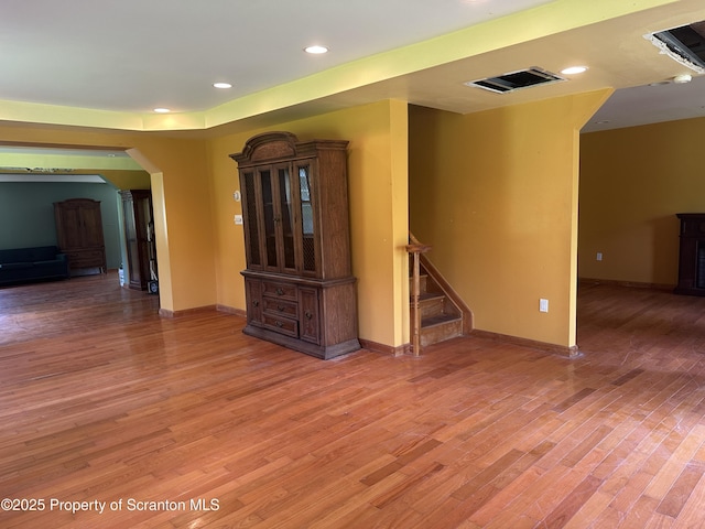 439 Old Union Rd, Equinunk, PA 18417 - spare room featuring light wood-type flooring, arched walkways, stairs, and recessed lighting