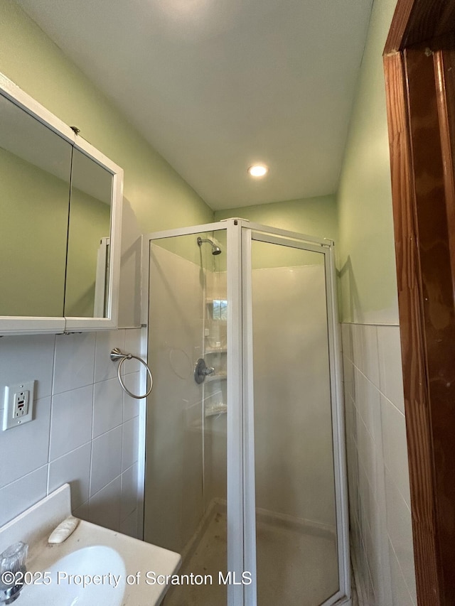 439 Old Union Rd, Equinunk, PA 18417 - bathroom featuring tile walls, a shower stall, and recessed lighting