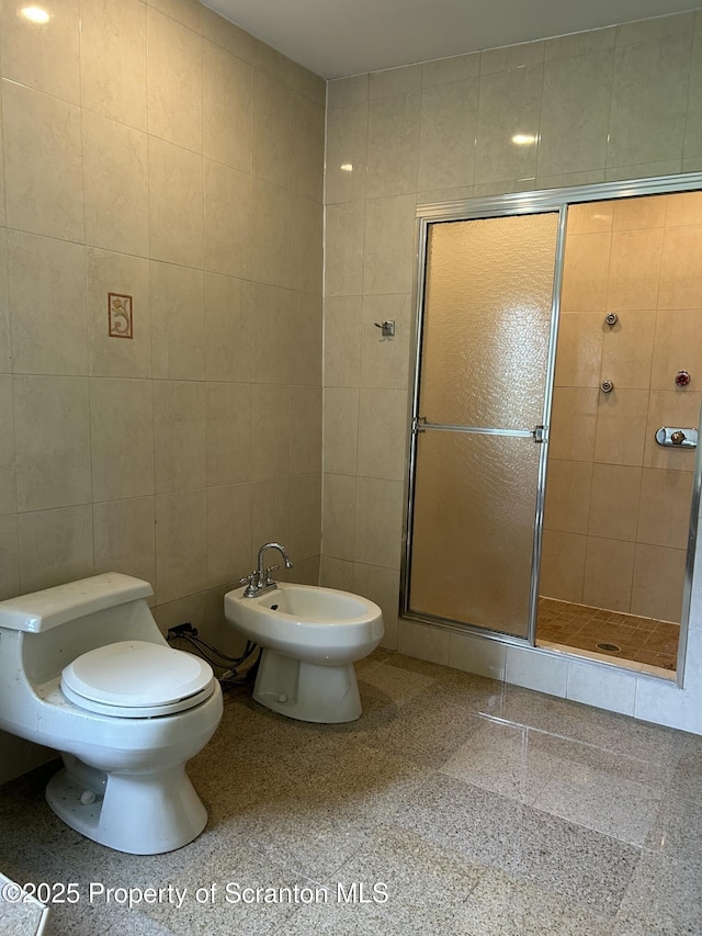 439 Old Union Rd, Equinunk, PA 18417 - full bath featuring a shower stall, a bidet, tile walls, and speckle patterned floor