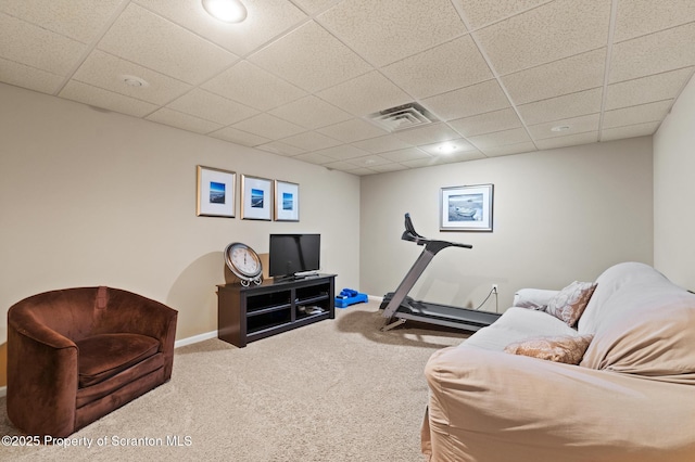 interior space featuring a drop ceiling