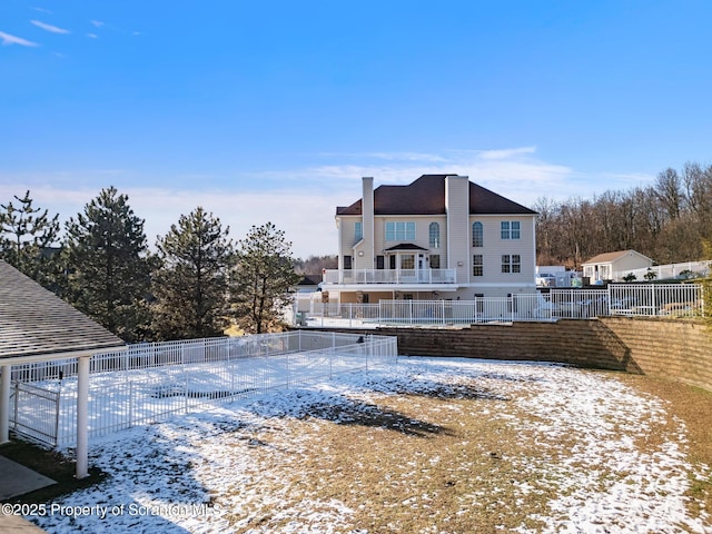 view of snow covered property