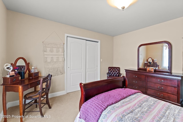 carpeted bedroom featuring a closet