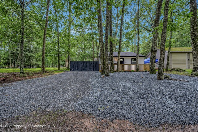 28 Holland Rd, Hawley, PA 18428 - view of front facade with gravel driveway