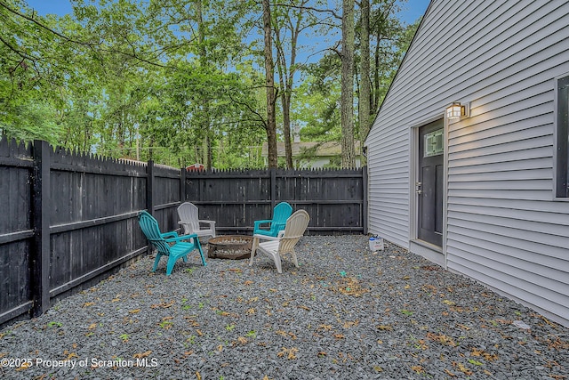 28 Holland Rd, Hawley, PA 18428 - fenced backyard with a fire pit
