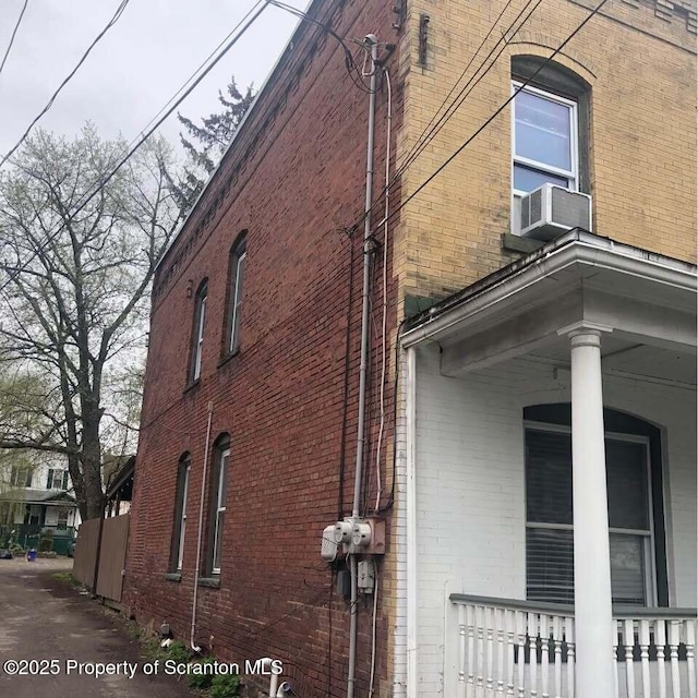 view of side of property featuring cooling unit