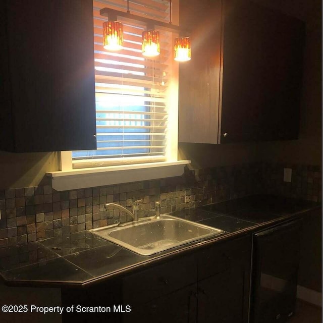 kitchen with decorative backsplash and sink