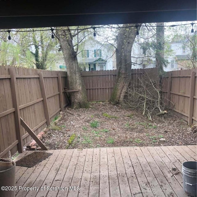 view of yard featuring a wooden deck