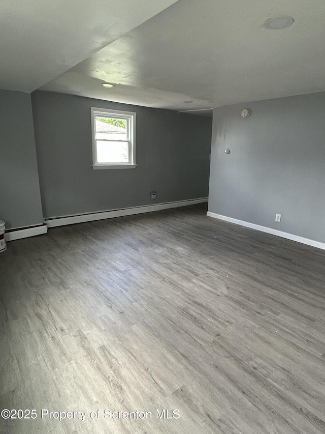627 May St, Mayfield, PA 18433 - below grade area featuring baseboards and wood finished floors