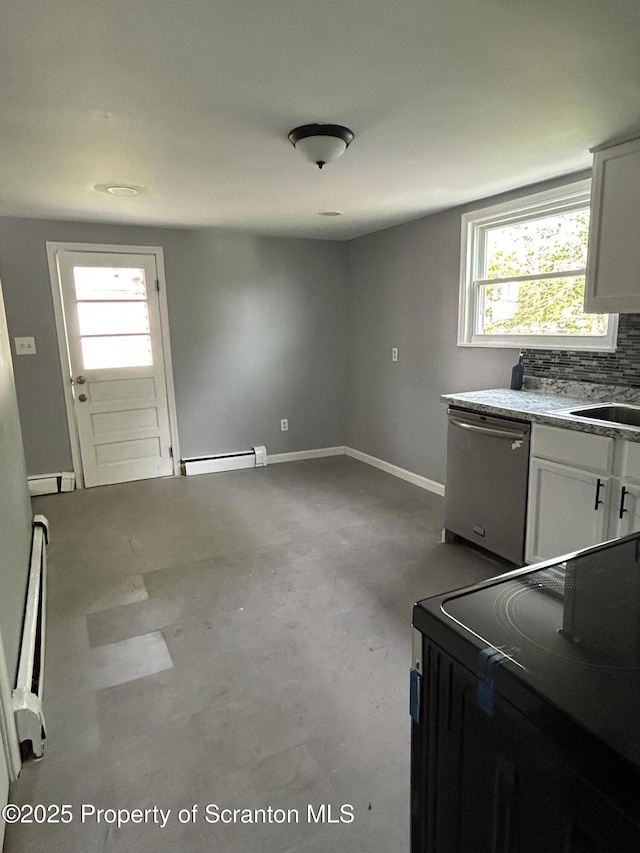 627 May St, Mayfield, PA 18433 - unfurnished dining area featuring concrete flooring, baseboards, a sink, and a baseboard radiator