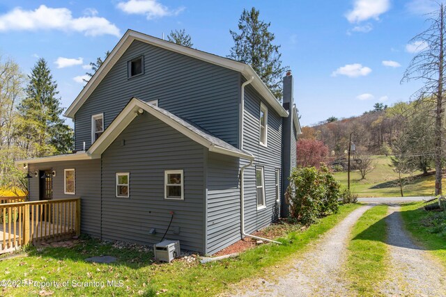 675 Apple Tree Rd, Harding, PA 18643 - view of side of property featuring a chimney and driveway