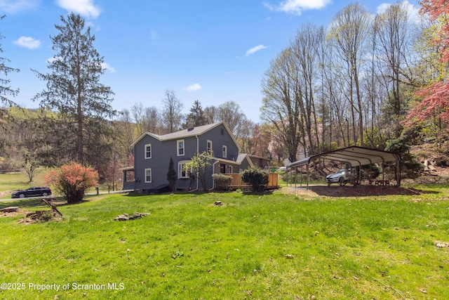 675 Apple Tree Rd, Harding, PA 18643 - view of property exterior with a carport, a lawn, and a chimney