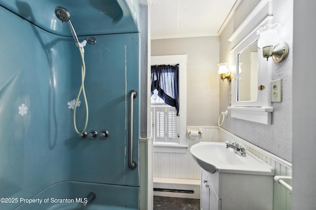 675 Apple Tree Rd, Harding, PA 18643 - bathroom with wainscoting, vanity, ornamental molding, bathtub / shower combination, and a textured wall