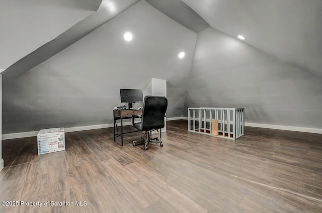 home office with baseboards, vaulted ceiling, wood finished floors, and recessed lighting