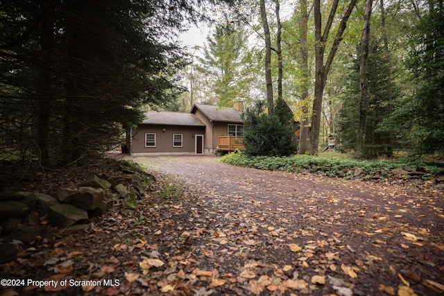 view of front of home with a wooden deck