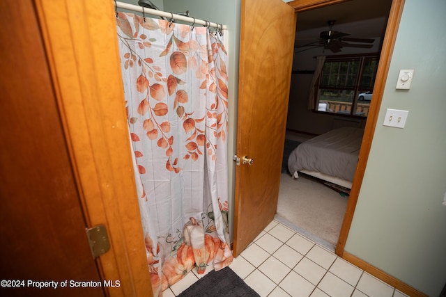 bathroom featuring tile patterned floors and ceiling fan