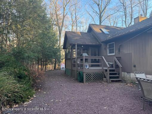 exterior space featuring a deck