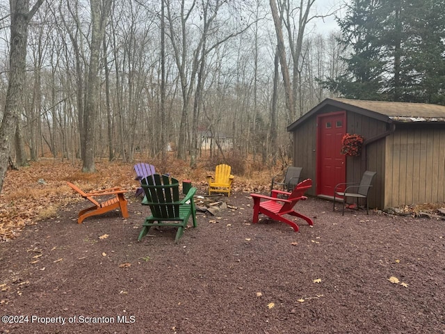 view of play area featuring a shed