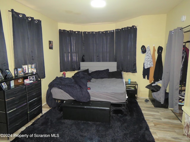 bedroom featuring light wood-type flooring