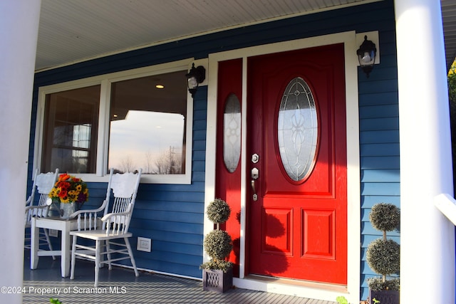 property entrance with a porch