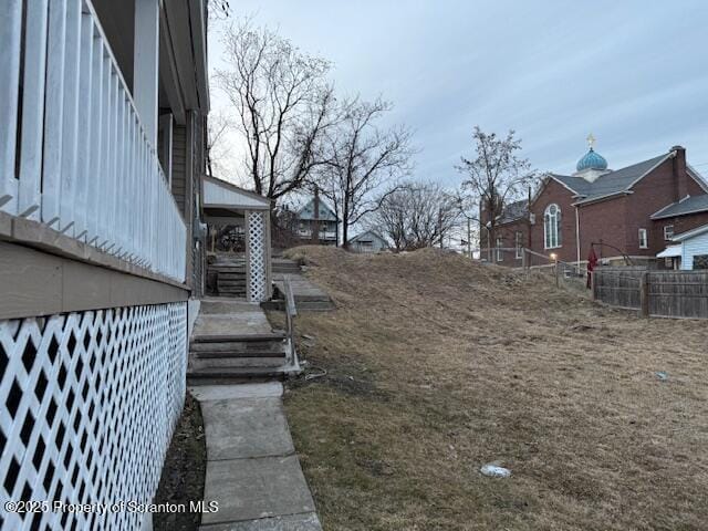 view of yard featuring fence