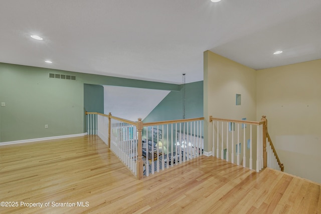 33 Hedge Row Run, Clarks Summit, PA 18411 - hallway featuring wood finished floors, recessed lighting, an upstairs landing, and lofted ceiling