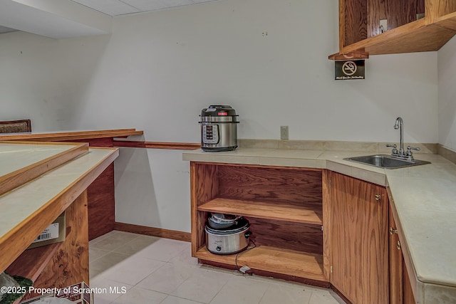33 Hedge Row Run, Clarks Summit, PA 18411 - kitchen with light countertops, brown cabinetry, open shelves, and light tile patterned flooring