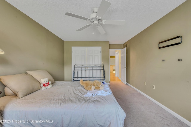 33 Hedge Row Run, Clarks Summit, PA 18411 - carpeted bedroom featuring a ceiling fan, a closet, and a textured ceiling