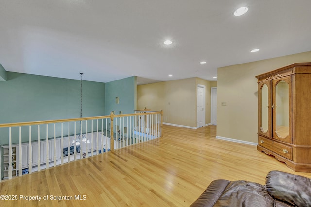 33 Hedge Row Run, Clarks Summit, PA 18411 - hallway featuring light wood-type flooring, recessed lighting, and an upstairs landing