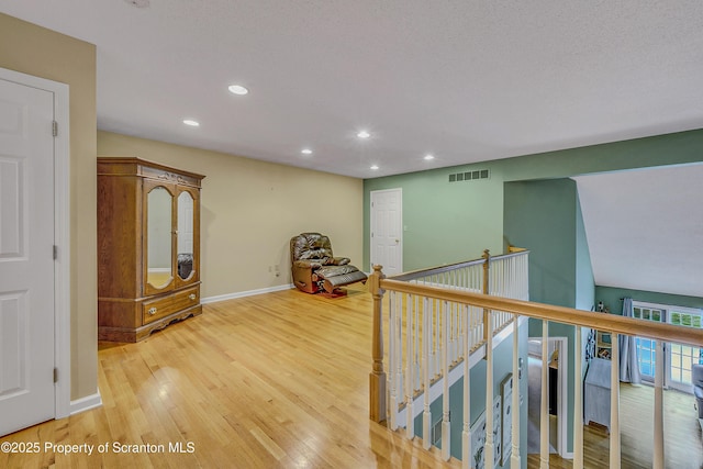 33 Hedge Row Run, Clarks Summit, PA 18411 - corridor with recessed lighting, light wood-style floors, and an upstairs landing