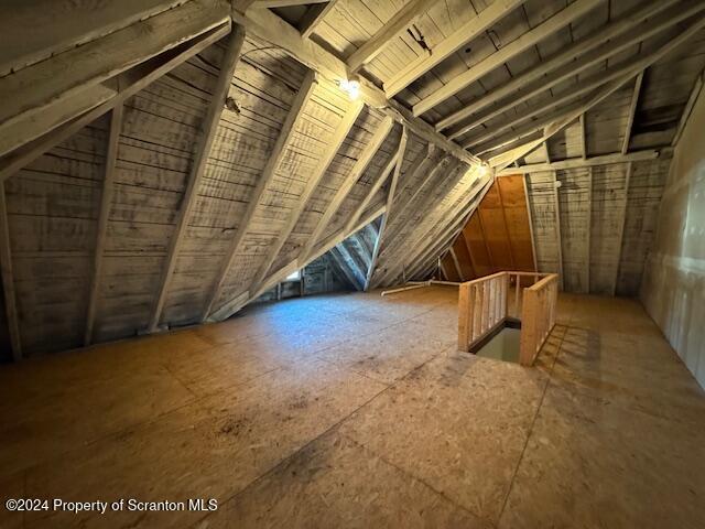 view of unfinished attic