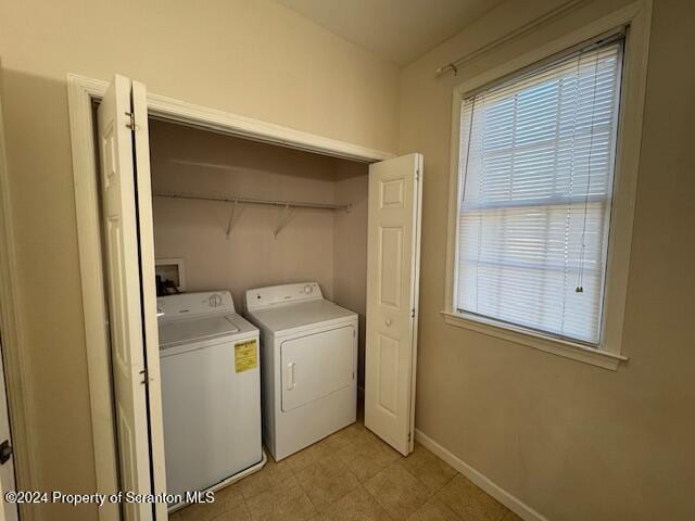 washroom featuring separate washer and dryer