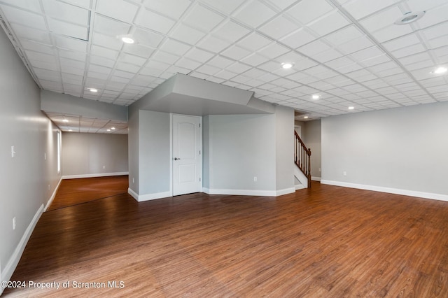 basement featuring hardwood / wood-style floors