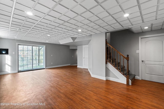 unfurnished living room with hardwood / wood-style flooring