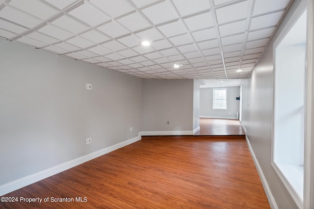 empty room with hardwood / wood-style flooring