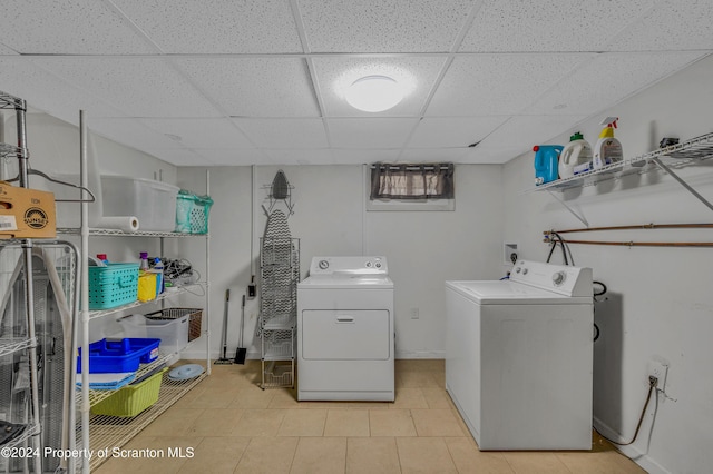 laundry area with independent washer and dryer