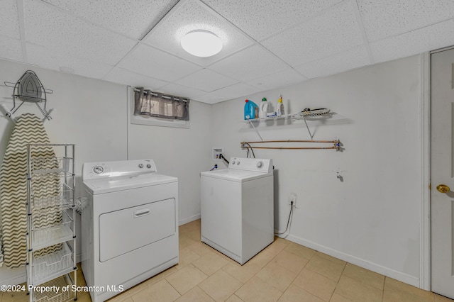 washroom with washer and dryer