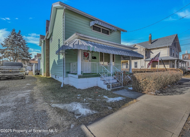 bungalow-style house featuring covered porch