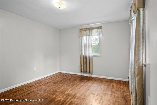 206 Florence Dr, Clarks Summit, PA 18411 - empty room featuring wood finished floors and baseboards