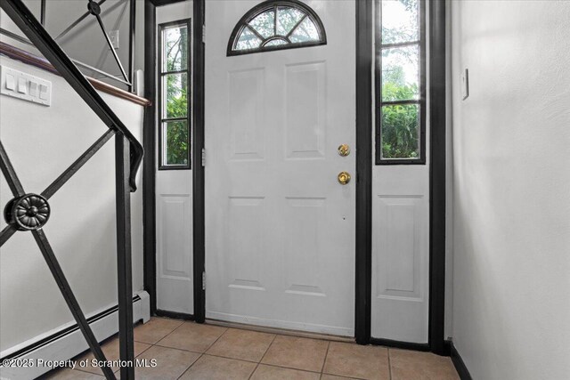 206 Florence Dr, Clarks Summit, PA 18411 - entryway featuring a baseboard heating unit and light tile patterned flooring