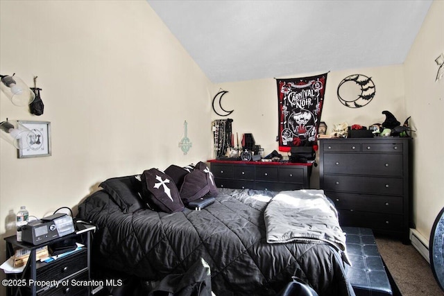 carpeted bedroom with vaulted ceiling and a baseboard heating unit