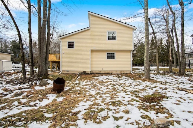 view of snow covered property