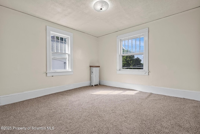 818 Cherry St, Scranton, PA 18505 - unfurnished room with a textured ceiling and carpet flooring