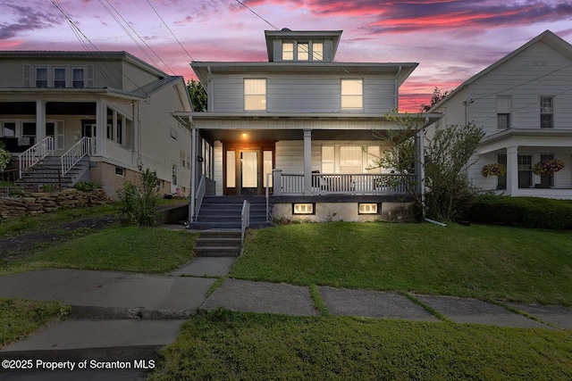 818 Cherry St, Scranton, PA 18505 - american foursquare style home featuring covered porch, a front yard, and stairway