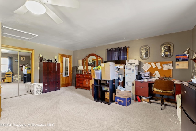 office space featuring carpet and ceiling fan