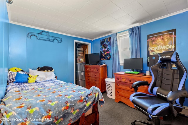 carpeted bedroom with crown molding