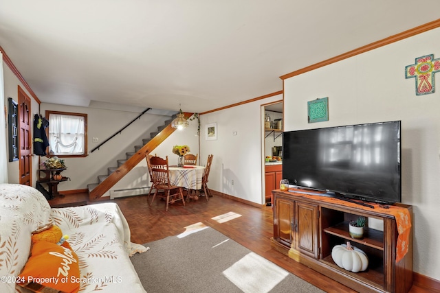 living room featuring dark hardwood / wood-style flooring and ornamental molding