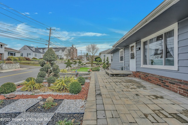 view of patio / terrace featuring a residential view